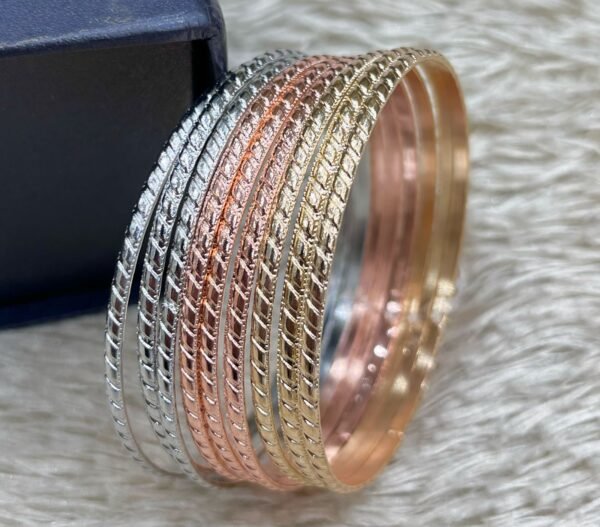 Set of polished stainless steel bangles with a sleek